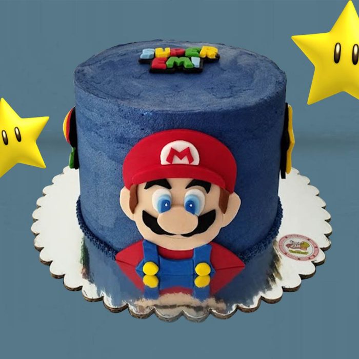 Pastel de Mario Bros. Pastel decorado con betún e imagen y detalles en fondant de Mario Bros.